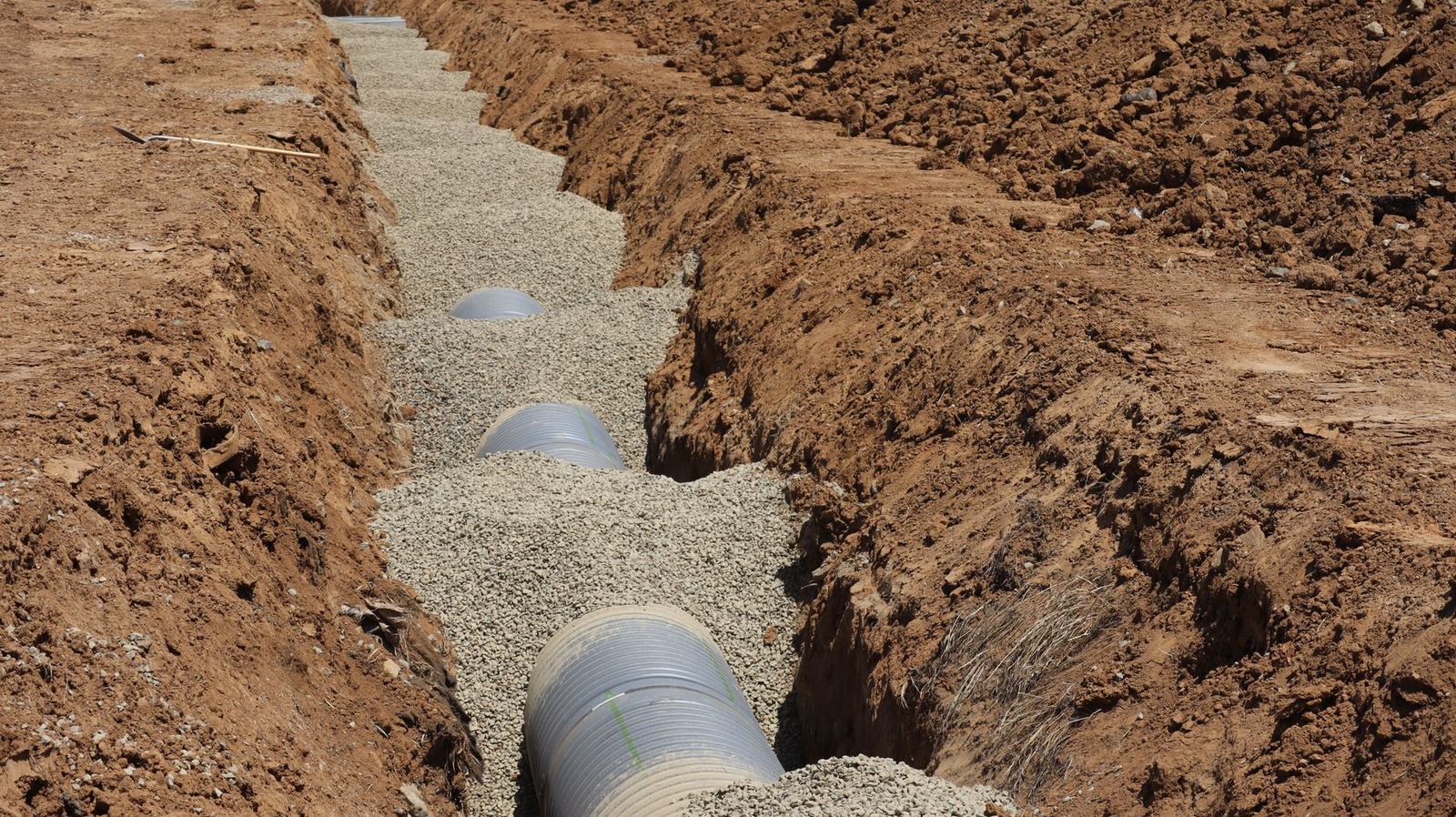 french drain trench gravel pipe - Lancaster French Drain